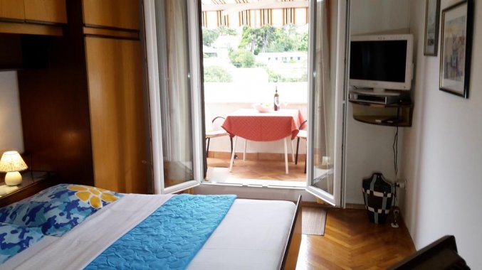 Slaapkamer van een appartement van Appartementen Lia in Dubrovnik