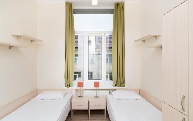 Tweepersoonskamer met twee aparte beden in hotel Corner stedentrip Vilnius