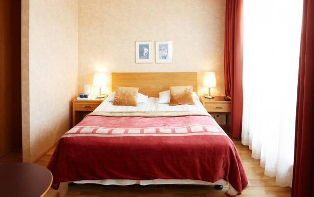 Tweepersoonskamer van hotel Fosshotel Rauoara