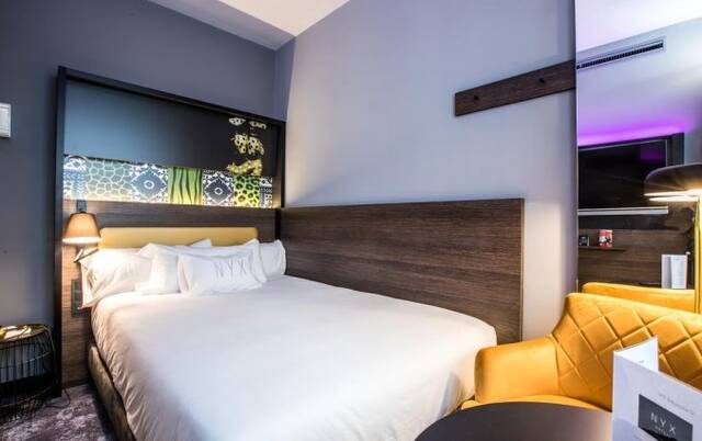 Slaapkamer van hotel NYX in Madrid