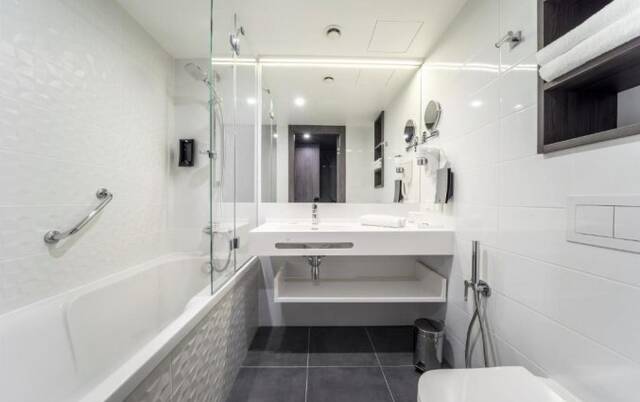 Badkamer van Hotel Wellton Riverside Spa in Riga
