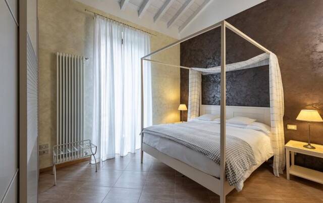 Tweepersoonskamer van hotel Mastino in Verona