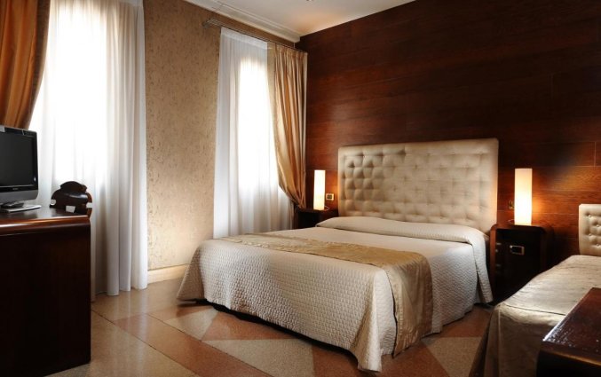 Slaapkamer van Hotel Abbazia