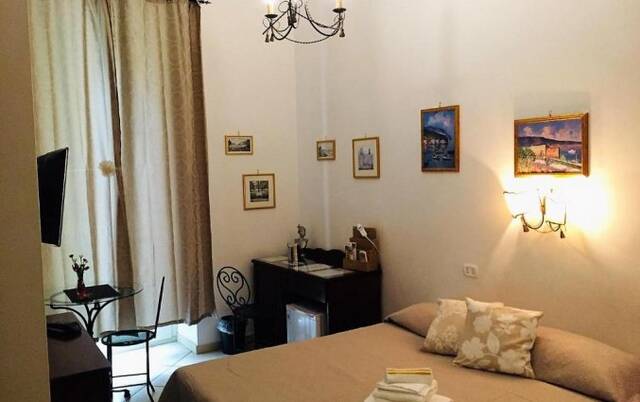 Tweepersoonskamer van Bed & Breakfast Art Suite Principe Umberto in Napels