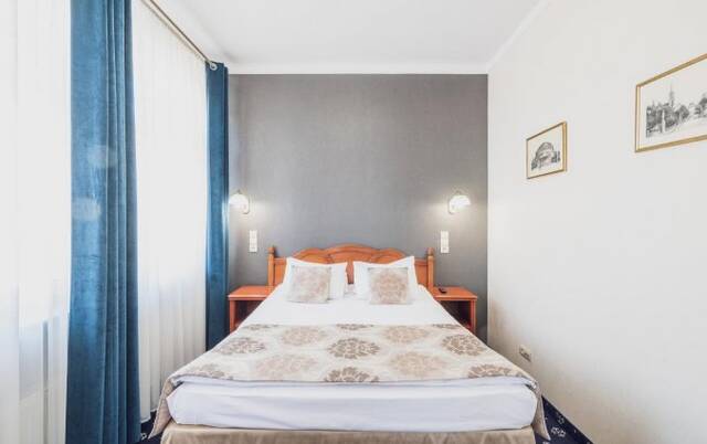 Tweepersoonskamer van Hotel Europejski in Wrocław