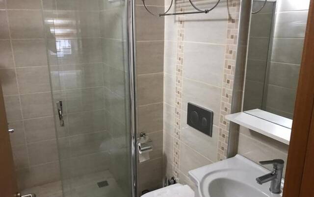 Badkamer van Timeks Hotel