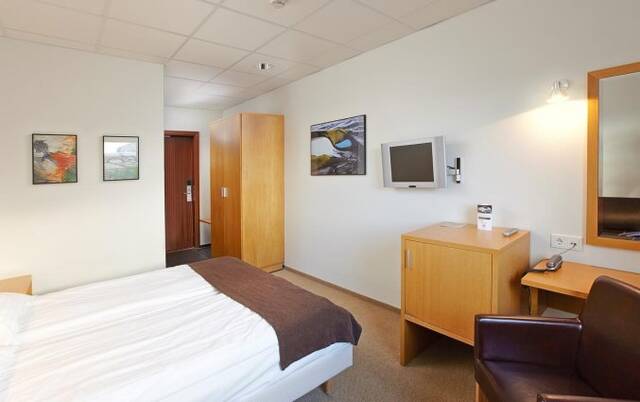 Tweepersoonskamer van hotel cabin in IJsland