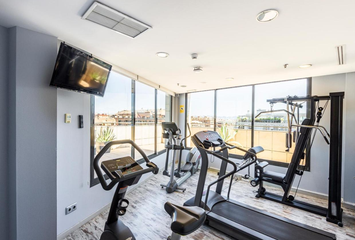 Fitnessruimte Hotel Valencia Oceanic Affiliated by Meliá