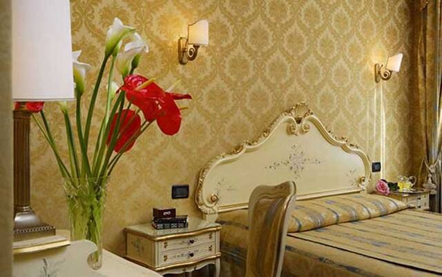 Tweepersoonskamer van Hotel Gorizia a la Valigia in Venetie