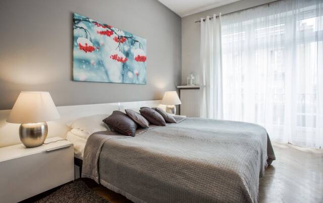 Slaapkamer van een appartement van Appartementen 4Seasons in Krakau