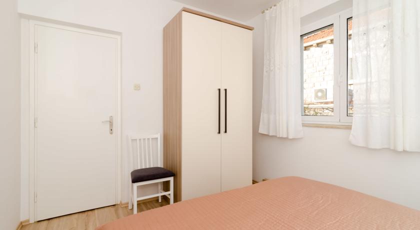 Slaapkamer van een appartement van Aparthotel Apartmani Vulicevic in Dubrovnik