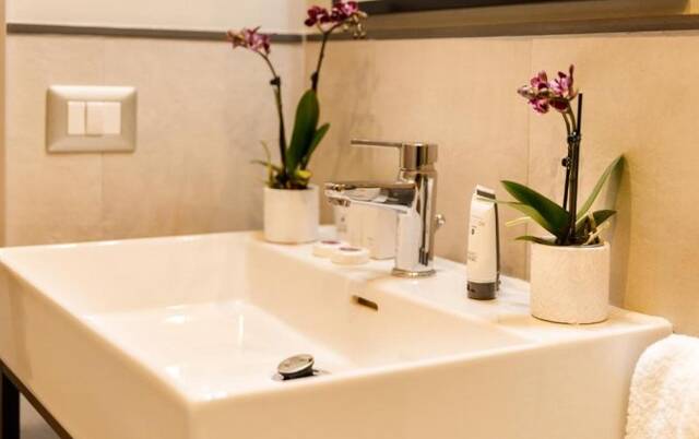 Badkamer in Hotel The Cross Rome