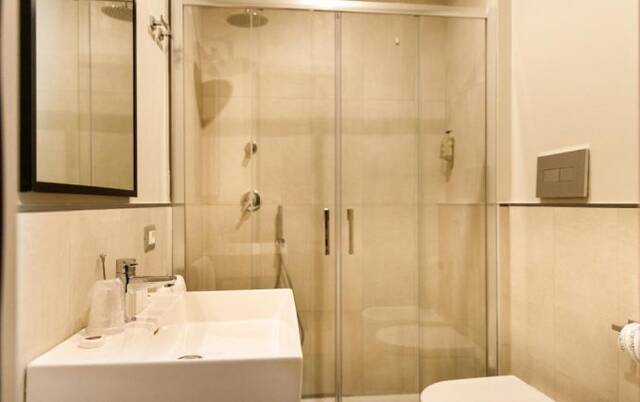 Badkamer in Hotel The Cross Rome
