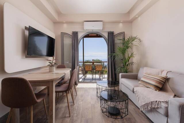 The Summit Escape - woonkamer met balkon