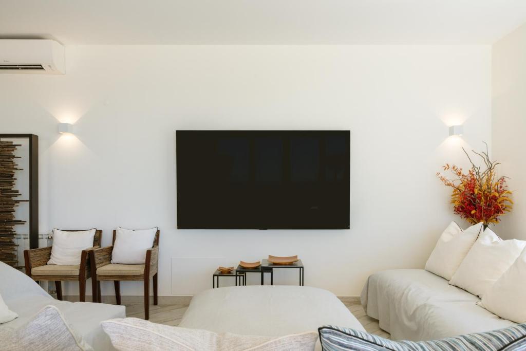 Casa Pôr do Sal - woonkamer met tv