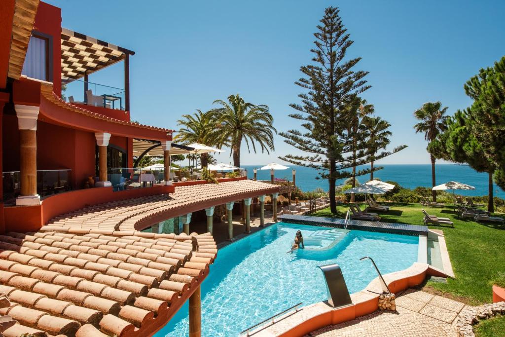 Boutique Hotel Miranda - zwembad met zeezicht en terras