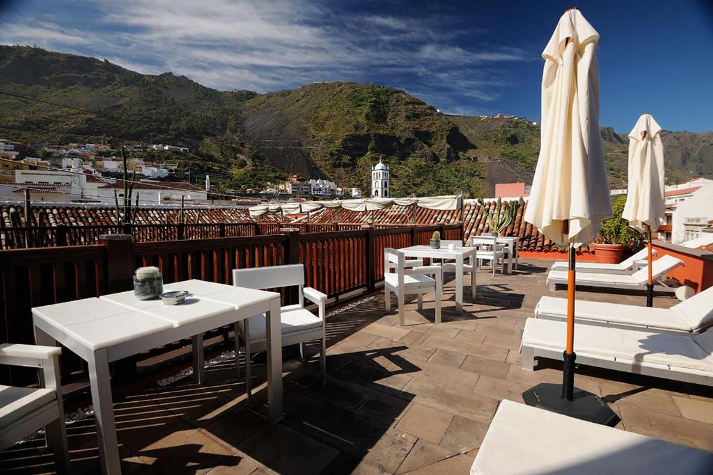 Boutique Hotel San Roque - dakterras met ligbedden