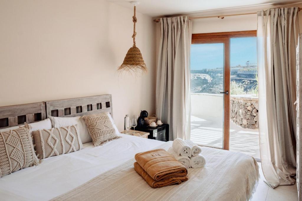 Boutique Eco Hotel Costa Magica - slaapkamer met balkon