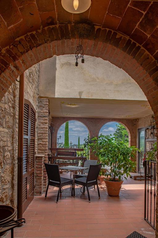 Il Casale del Cotone - poort met planten