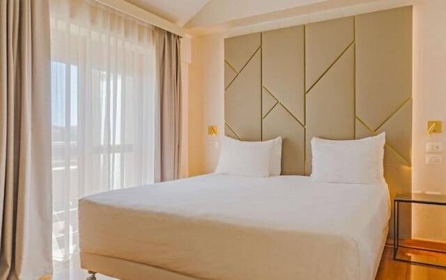 Kamer van NH Collection Roma Giustiniano