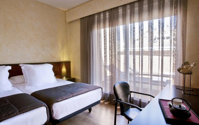 Tweepersoonskamer van hotel Derby in Barcelona