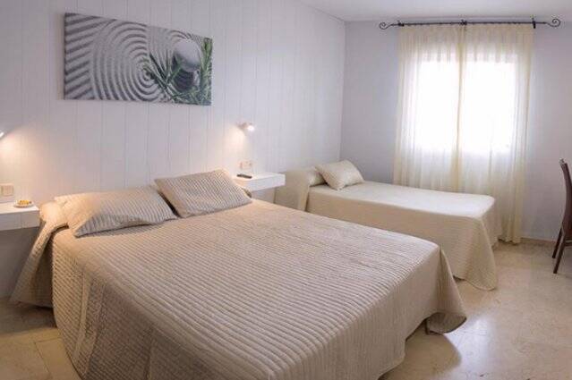 Tweepersoonskamer met tweepersoonsbed van Hotel Oasis