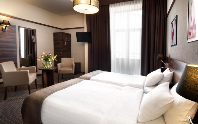 Twin beds van hotel Golden Tulip Krakow City Center stedentrip Krakau